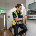 HMO electrical safety requirements testing consumer unit in UK hallway