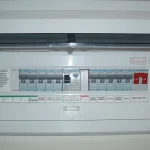 Electrical safety certificate London: modern UK Hager consumer unit with RCD protection, circuit breakers, and main isolation switch